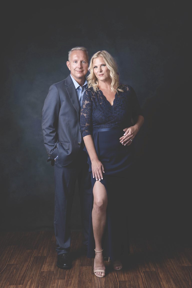 couples portrait of a husband and wife looking glamorous by tonya bolton photography
