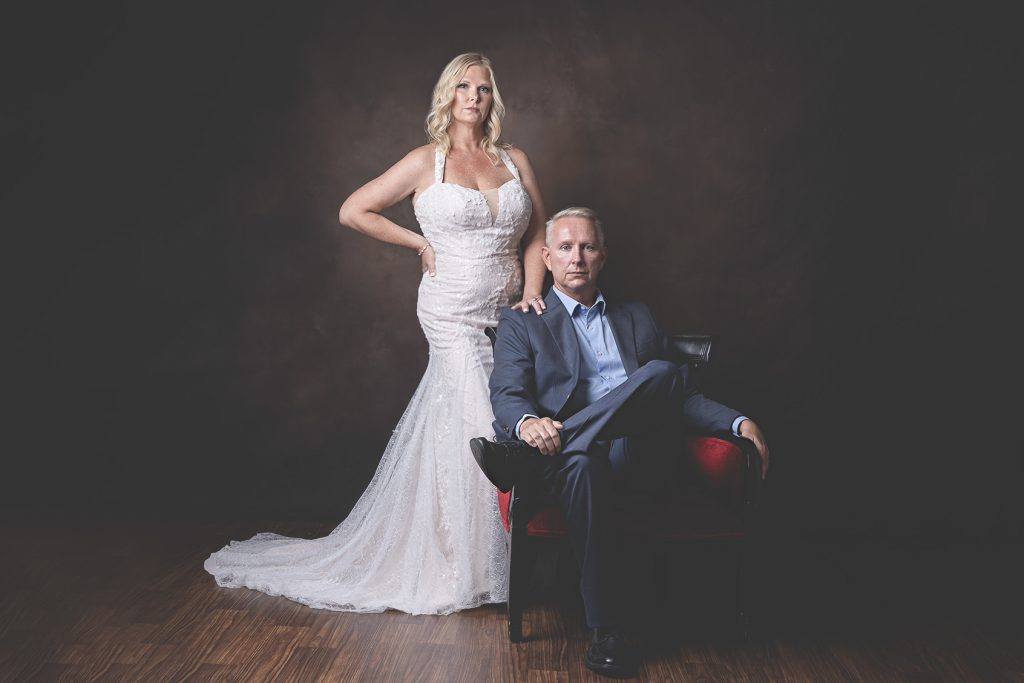 Husband and wife bridal portrait in studio with Tonya Bolton Photography.