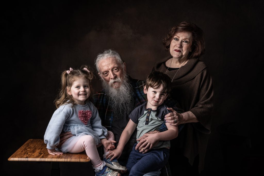 A portrait of grandparents with their grandchildren made by Tonya Bolton Photography in her studio located in Newport Ky.